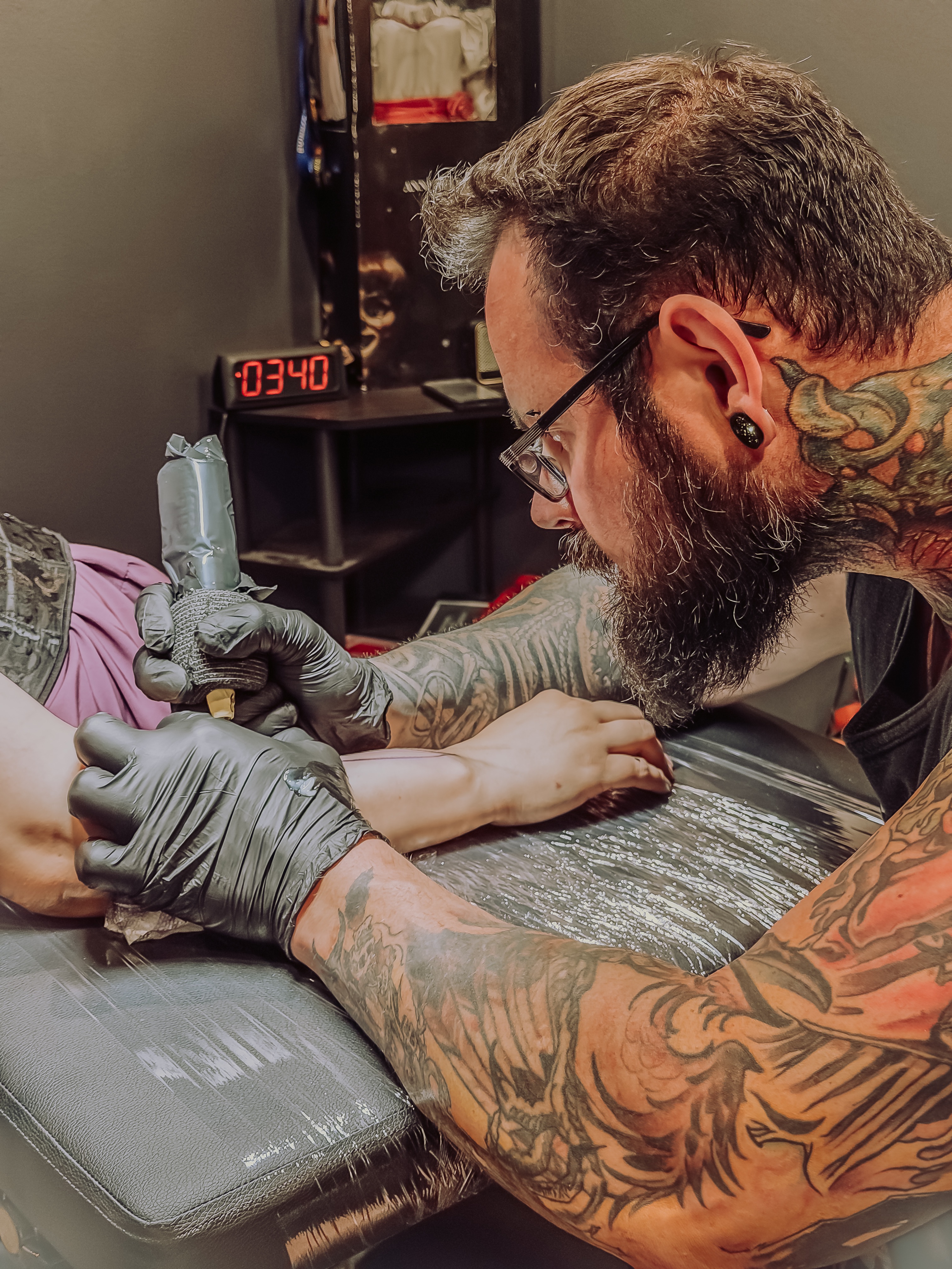 Klaatu Tattoo artist at work